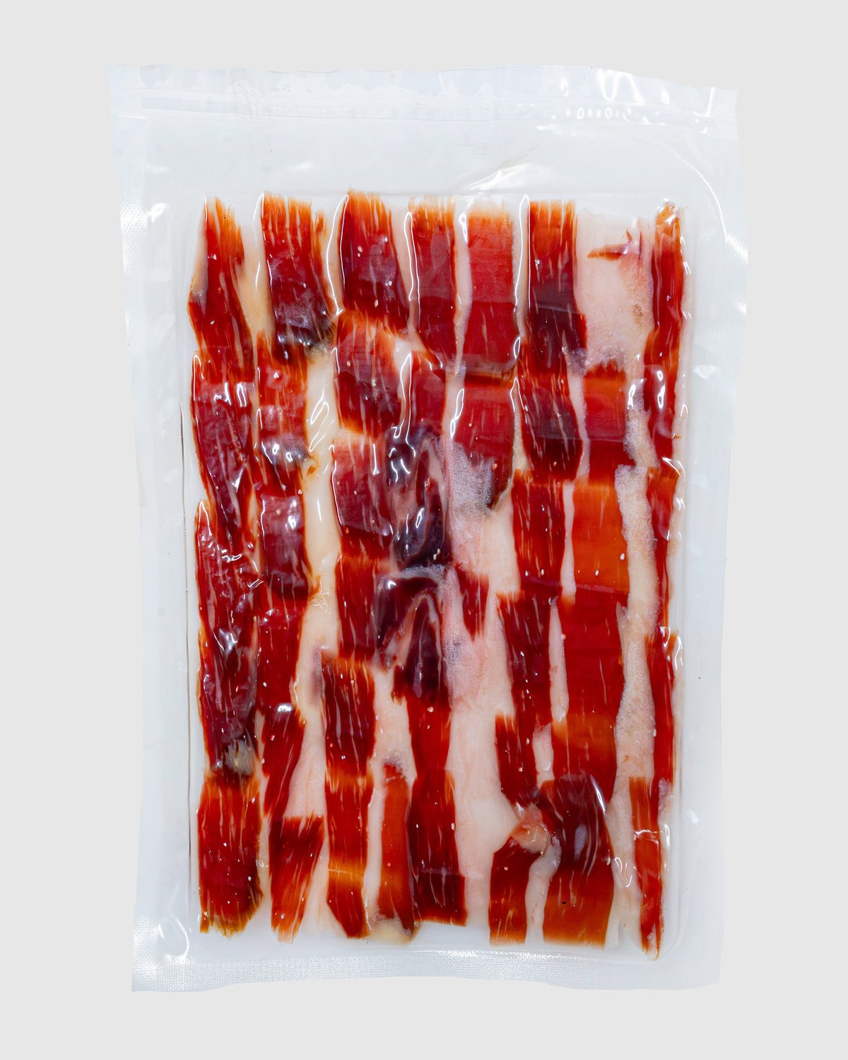 JAMÓN IBÉRICO 100% BELLOTA – TAGLIATO A MANO (80g)