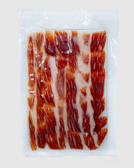 JAMÓN IBÉRICO 50% BELLOTA – TAGLIATO A MANO (80g)